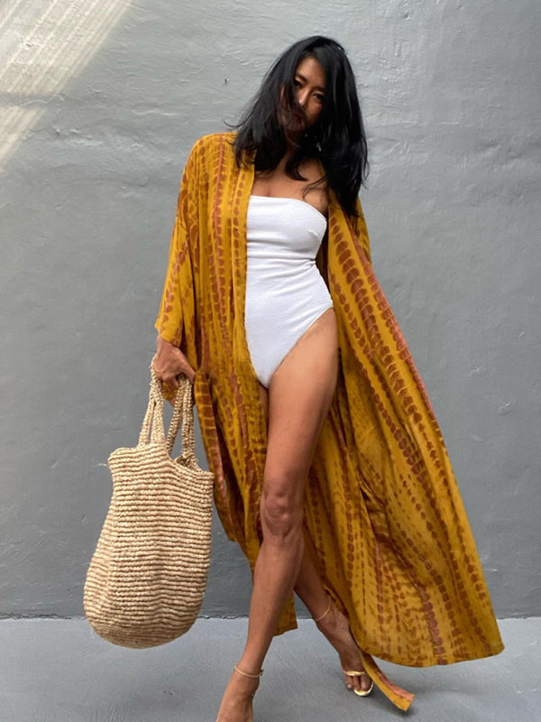 Voorkant van de modieuze dames kimono met strikriem, ideaal voor een chique lagenlook.