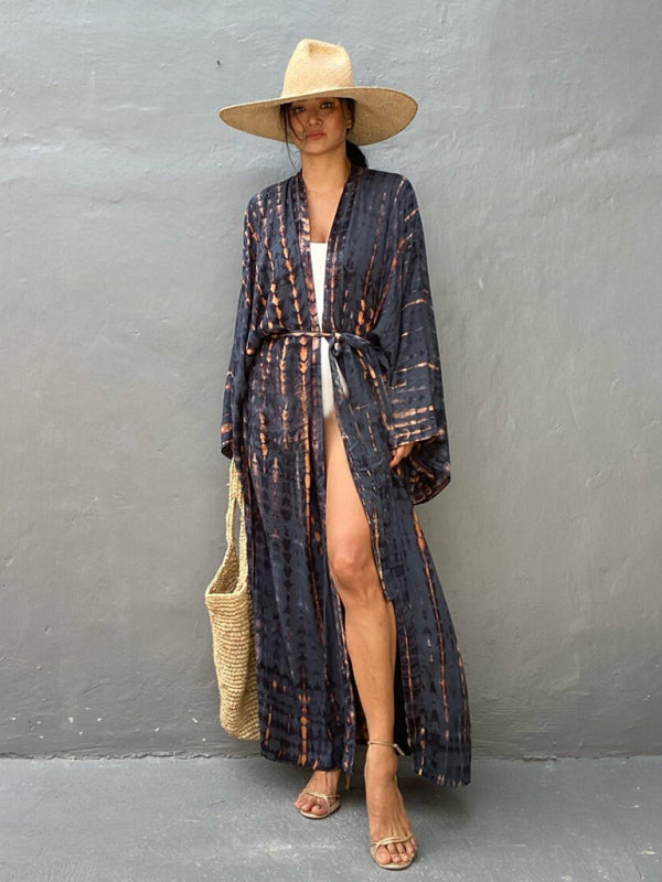 Close-up van de textuur van de geweven stof van de trendy dames kimono met strikriem.