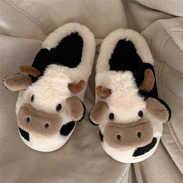 Dames Koe Slippers, zacht en warm, ideaal voor thuis. Comfortabel en modieus design.