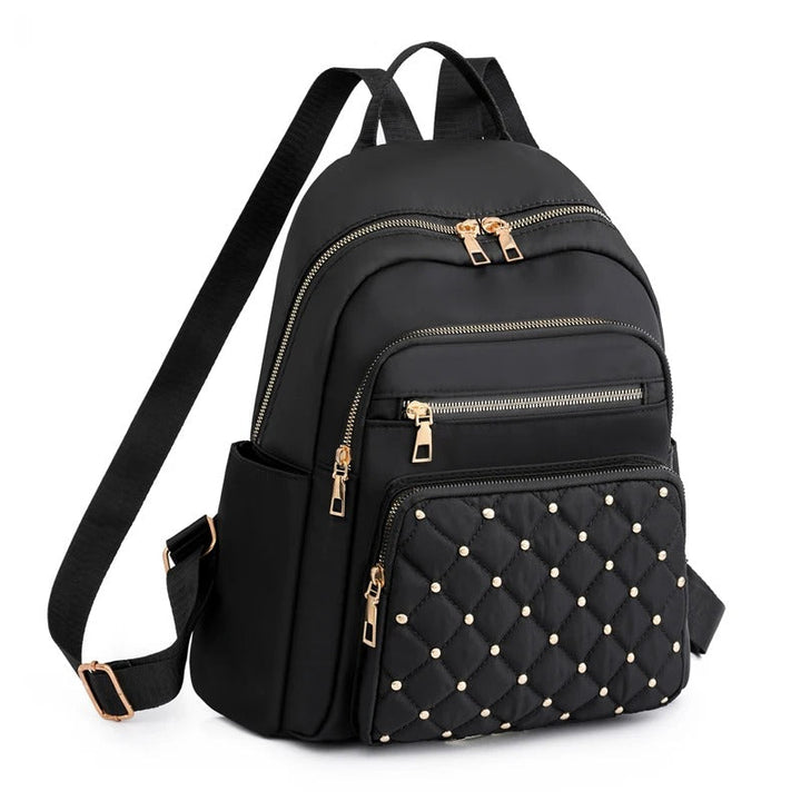Dames lichtgewicht waterafstotende nylon rugzak in zwart, ideaal voor school en reizen.