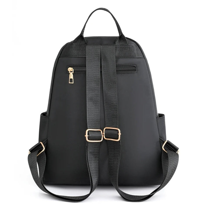 Set van zwarte & khaki lichtgewicht waterafstotende nylon damesrugzakken, perfect voor school & reizen.