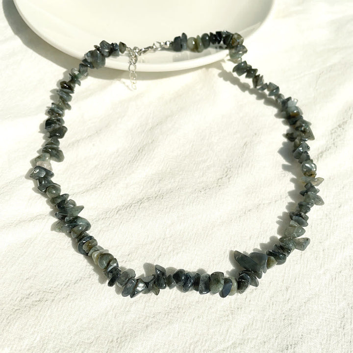 Dames ketting van gepolijst edelsteen, met energie en uniek design.