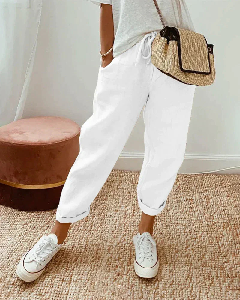 Elegante beige linnen broek voor dames, Meav, met losse pasvorm; stijlvol en veelzijdig voor de zomer.