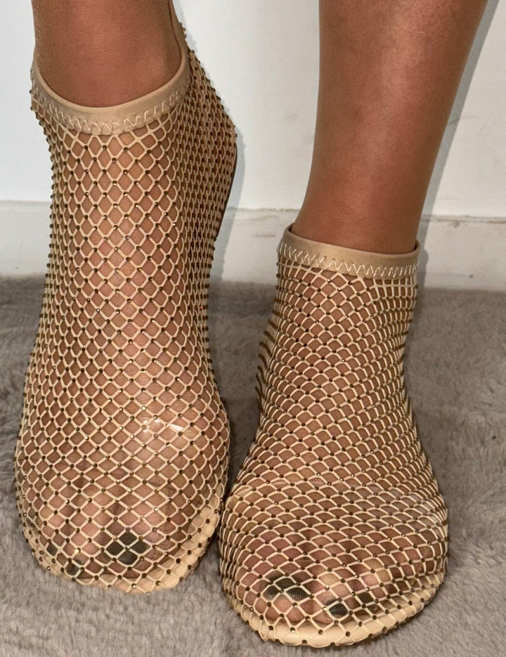 Nude Lyra ballerina's dames, comfortabel en glanzend. Stijlvolle flats, perfect voor werk of vrije tijd.