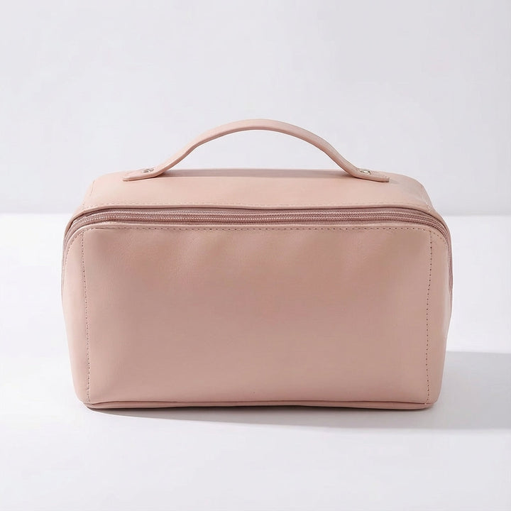 Dames reisaccessoire: een compact make-up tasje met diverse vakken voor geordende opslag van beauty items.