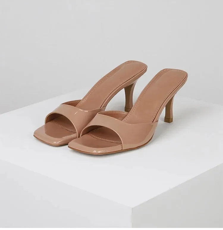 Comfortabele dames hakmules: veelzijdige instappers met open hak, perfect voor elke gelegenheid.