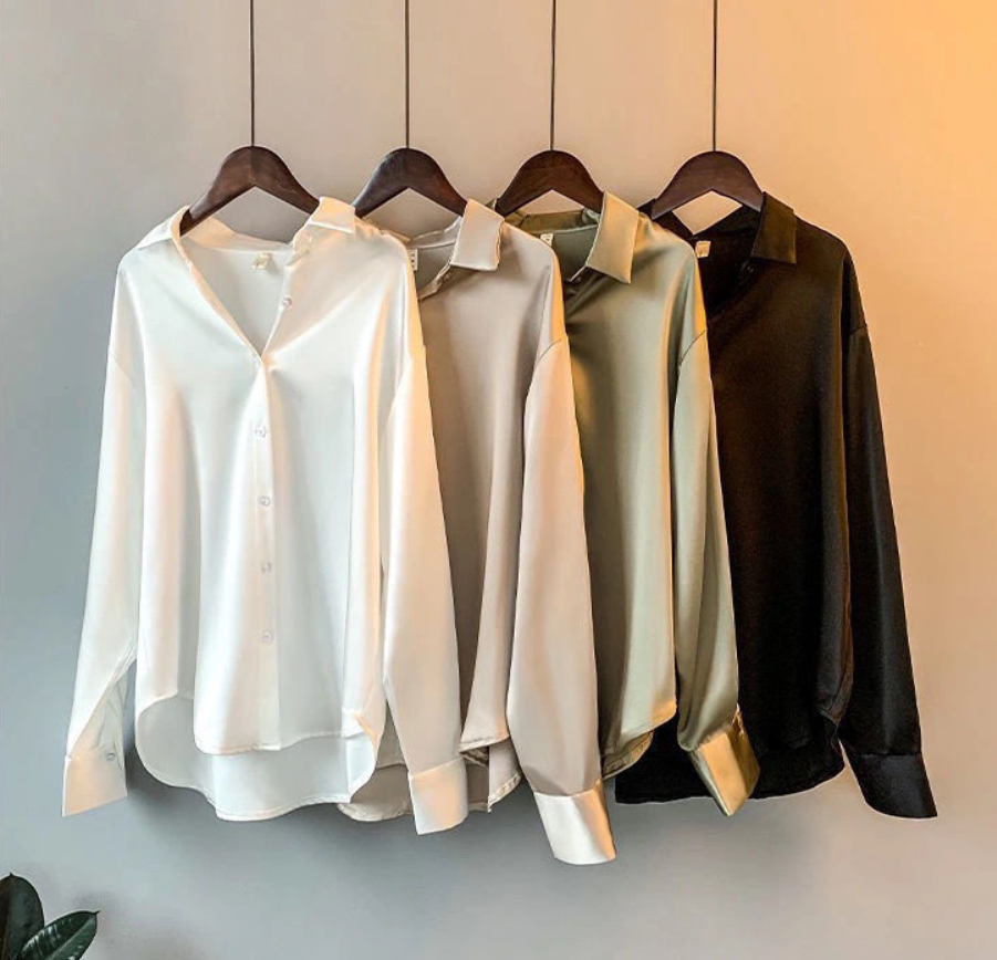 Luxe dames Myra blouse, effen en stijlvol, met een losse pasvorm. Ideaal voor modebewuste dames.