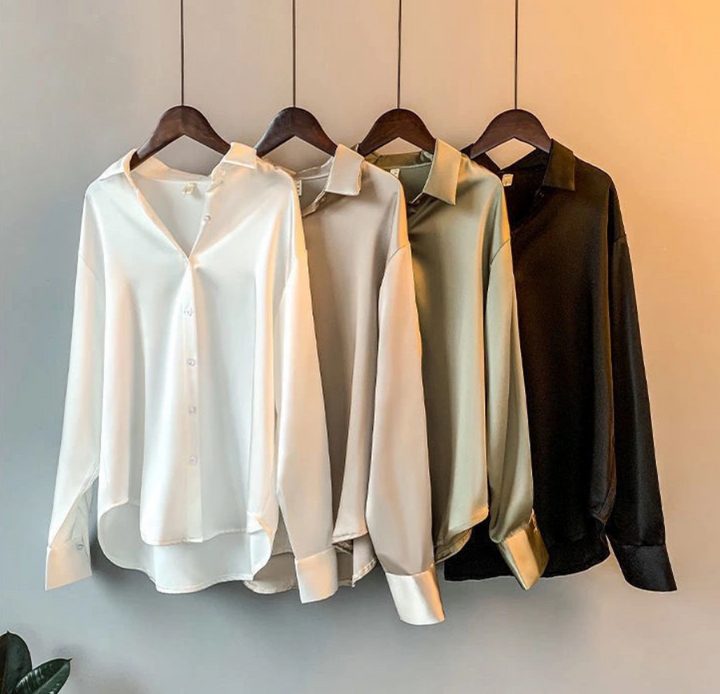 Luxe dames Myra blouse, effen en stijlvol, met een losse pasvorm. Ideaal voor modebewuste dames.