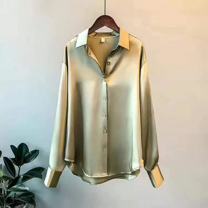 Myra damesblouse, effen ontwerp, lange mouwen. Een klassieke en stijlvolle top voor dameskleding.