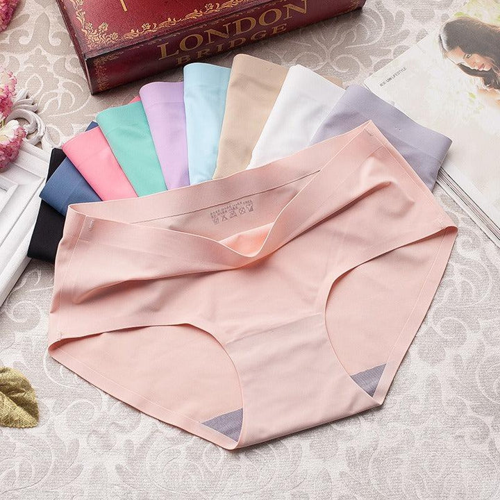 Close-up ademende nylon spandex stof van zijdezachte naadloze dames slip. Comfortabel en elastisch ondergoed.