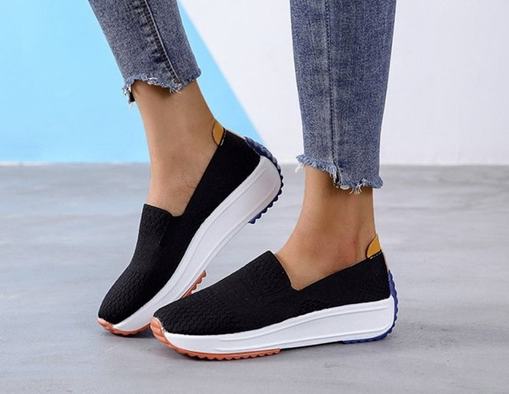 Comfortabele dames wandelschoenen met ergonomische voetondersteuning, ideaal voor lange dagen.