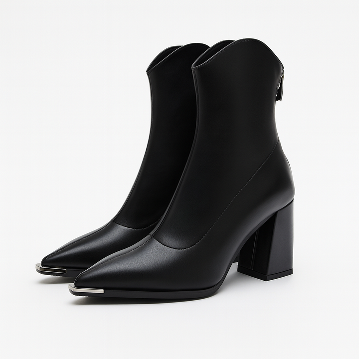 Zwarte orthopedische dames western enkellaarzen met voetboogondersteuning en comfortabele blokhak.