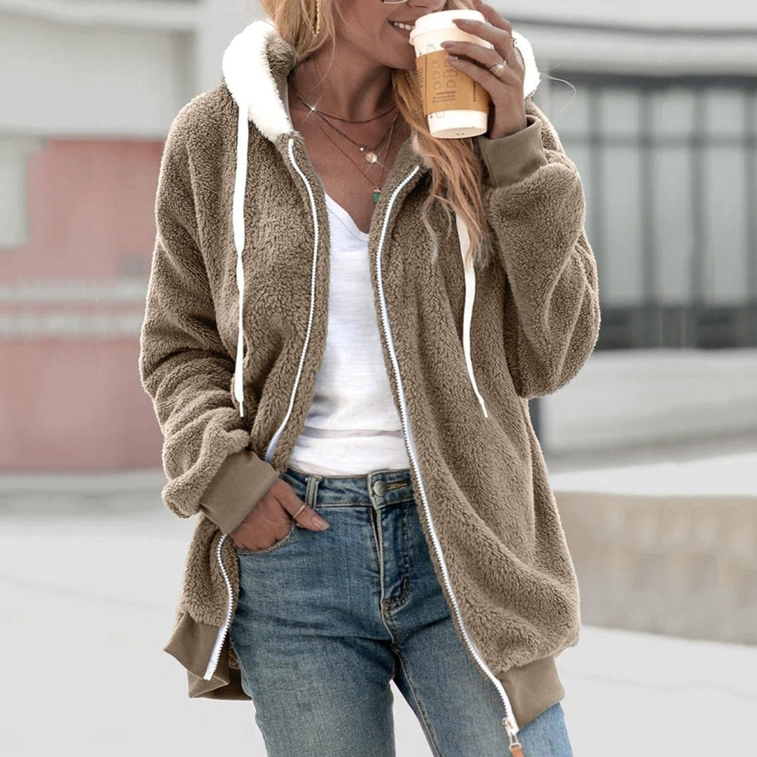 Comfortabel oversized dames vest van zachte teddy stof, met rits. Perfect voor koude dagen en mode.