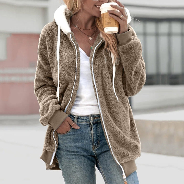 Comfortabel oversized dames vest van zachte teddy stof, met rits. Perfect voor koude dagen en mode.