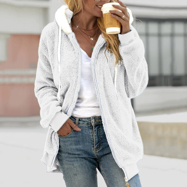 Modebewust oversized teddy vest Emilia voor dames, met ritssluiting. Een warme en zachte winter essential.