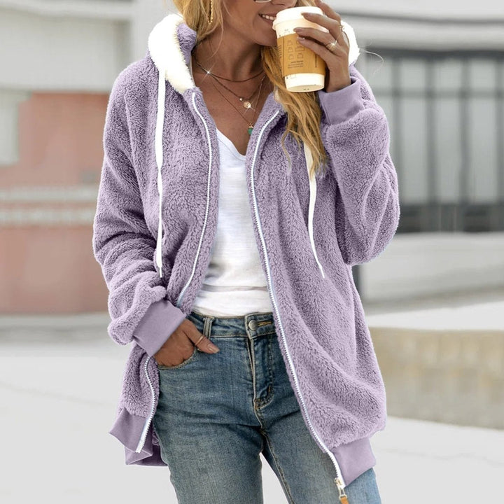 Warm en zacht oversized teddy vest Emilia met rits voor dames. Comfortabele en stijlvolle wintermode.