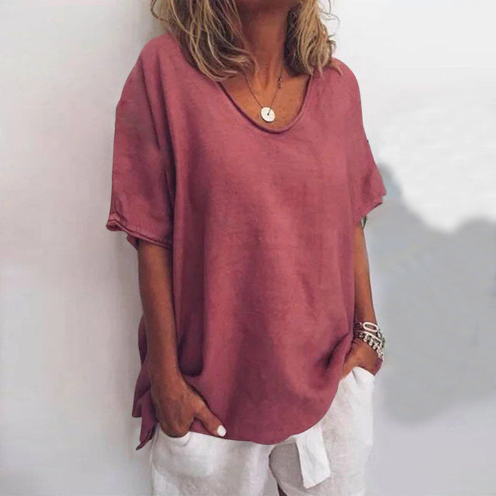 Dames casual T-shirt met V-hals en oversized model, perfect voor moeiteloos chique zomerse mode.