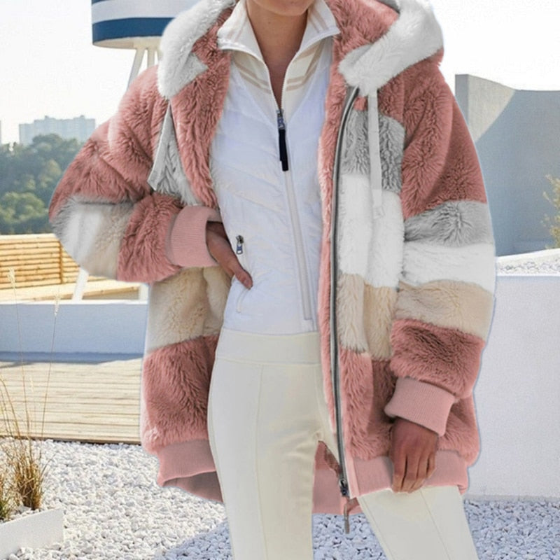 Oversized dames pluche vest met capuchon in blauw; comfortabel en stijlvol.