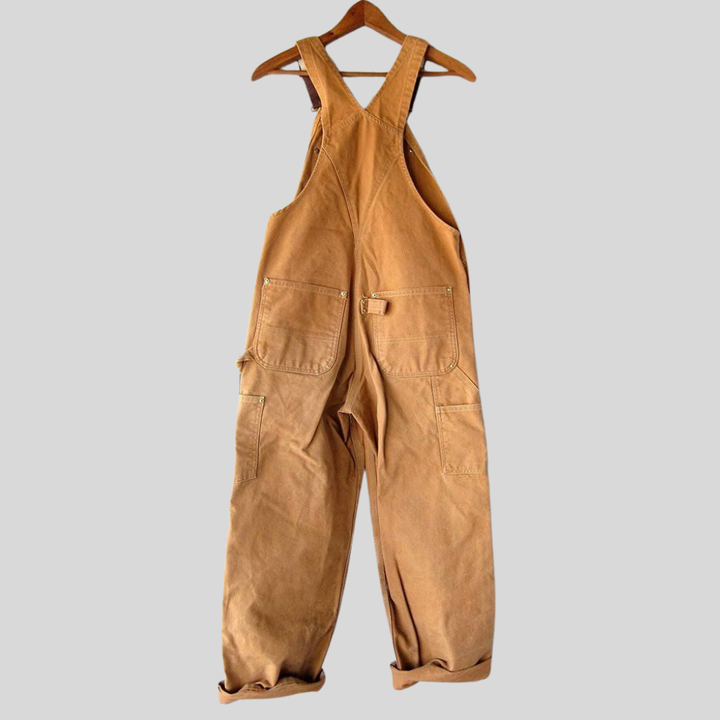 Dames retro tuinbroek in oranje katoenmix. Comfortabele, losse pasvorm voor een casual, stijlvolle dagelijkse look.