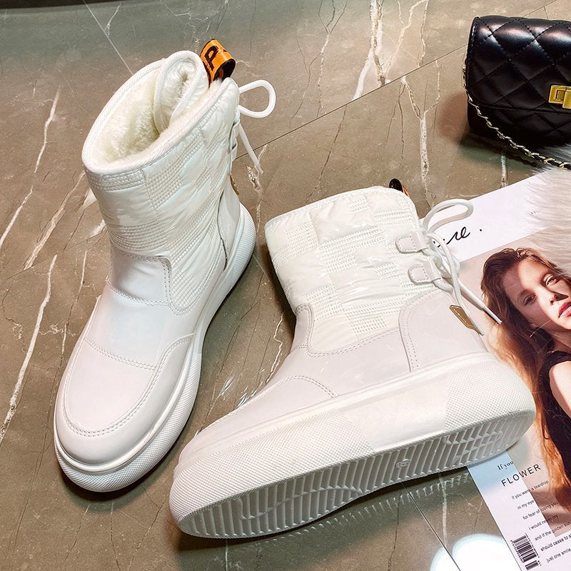 Stijlvolle winterlaarzen dames: Warme Rinnie laarzen met uniek design, ideaal voor koude winterdagen en damesmode.
