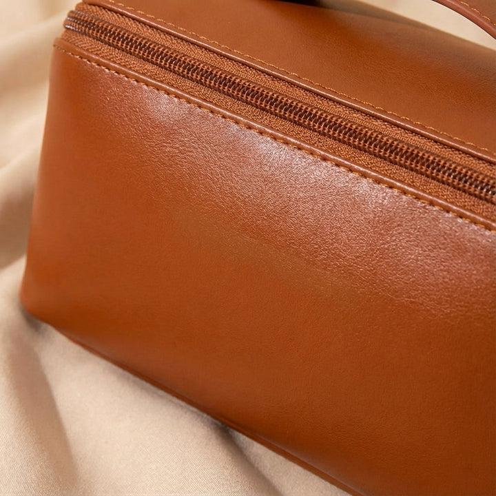 Roze dames beautycase, vierkant model, handig voor het opbergen van make-up en als reistas.
