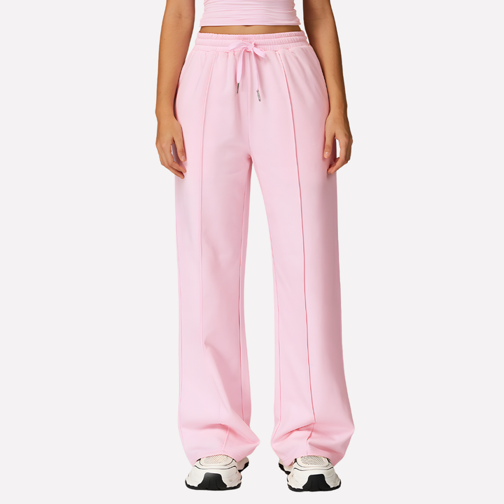 Dames casual joggingbroek met wijde pijpen, grijze sweatpants gecombineerd met top, ideaal voor dagelijks comfort.