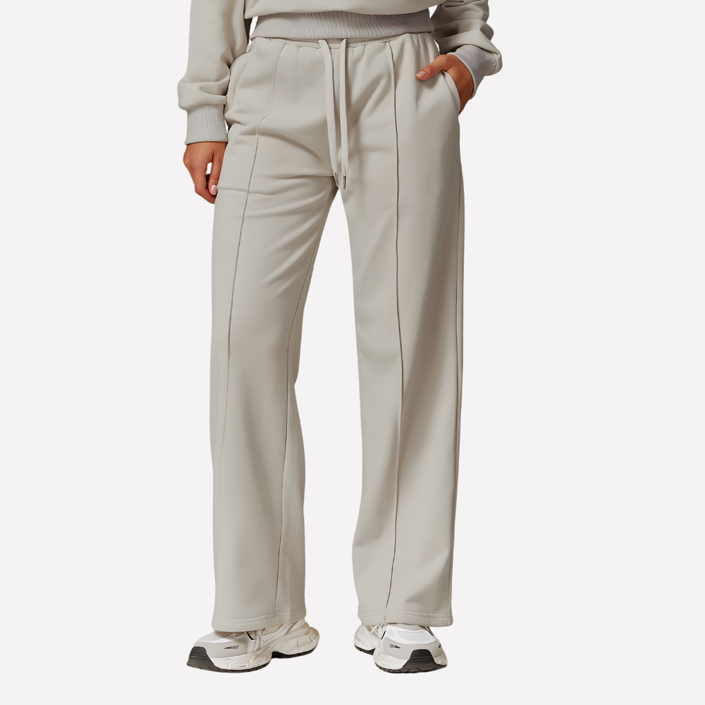Hoge taille van grijze dames sweatpants, wijde pijpen, benadrukt comfort en moderne casual stijl voor vrije tijd.