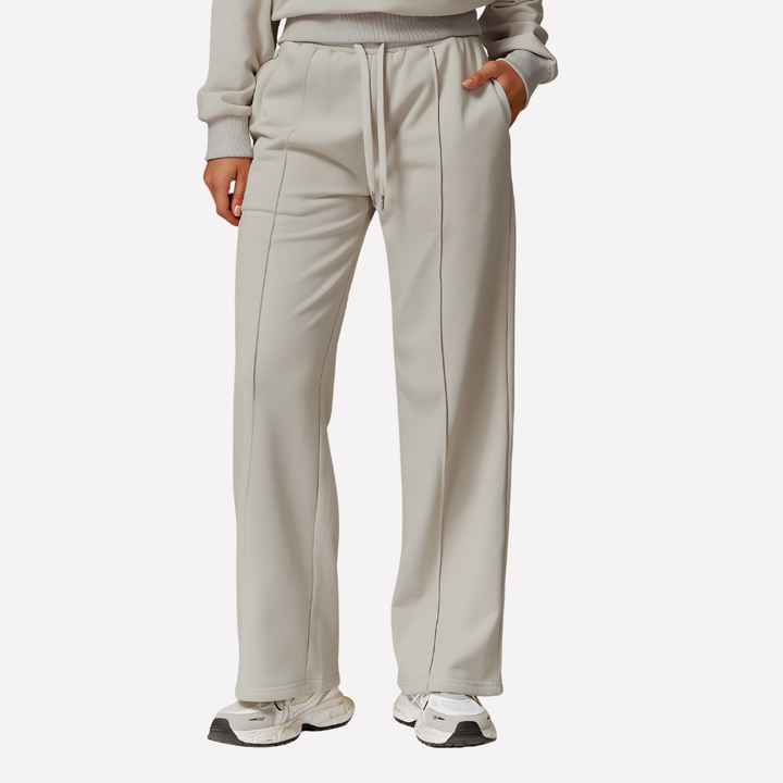 Hoge taille van grijze dames sweatpants, wijde pijpen, benadrukt comfort en moderne casual stijl voor vrije tijd.