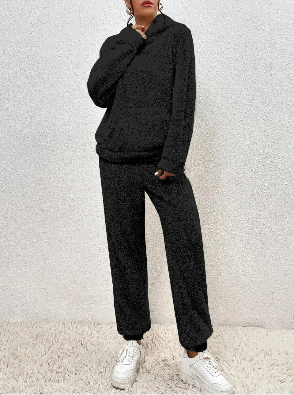 Cozy dames teddy huispak met capuchon, perfect als winter loungewear.