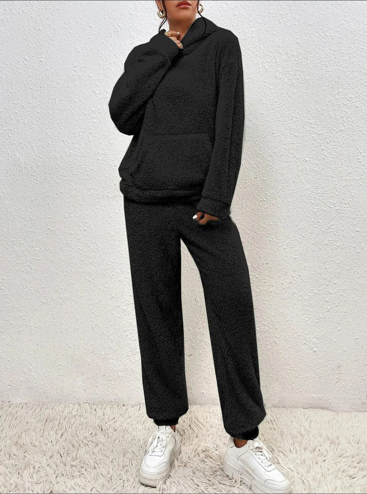 Cozy dames teddy huispak met capuchon, perfect als winter loungewear.