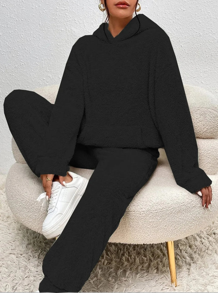 Dames winter huispak, cozy teddy materiaal en praktische capuchon.