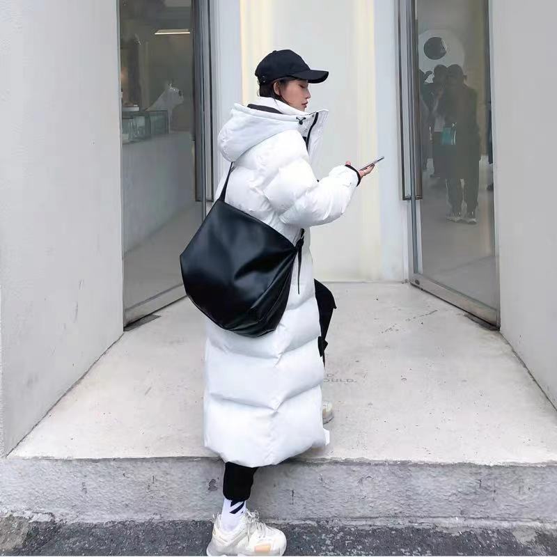 Luxe dames dons parka, modieus en warm. Essentiële winterkleding voor stijlvolle vrouwen.
