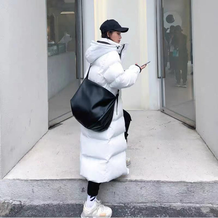 Luxe dames dons parka, modieus en warm. Essentiële winterkleding voor stijlvolle vrouwen.