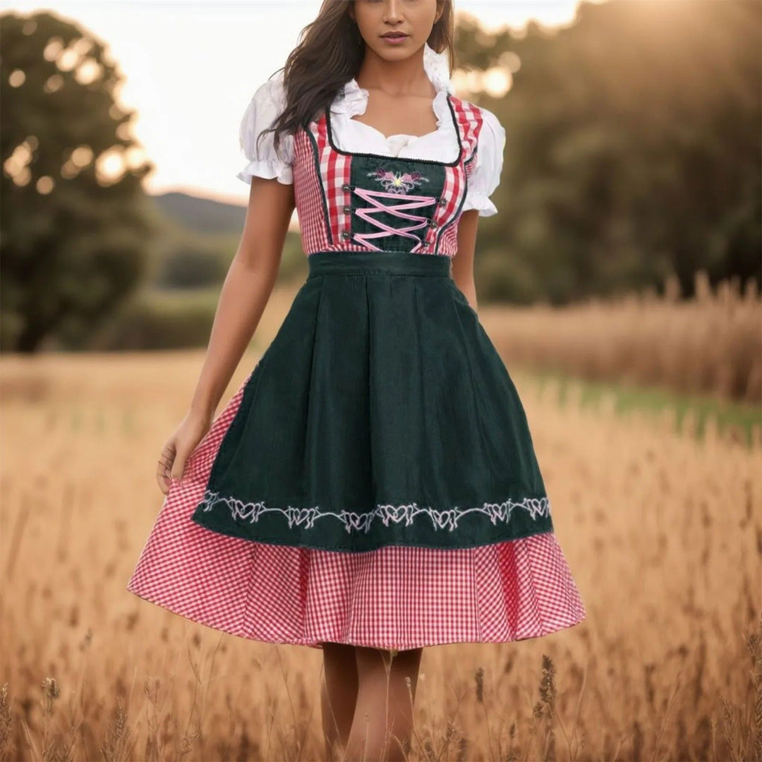 Dames traditionele geruite Oktoberfest dirndl in groen en zwart, perfecte feestkleding.