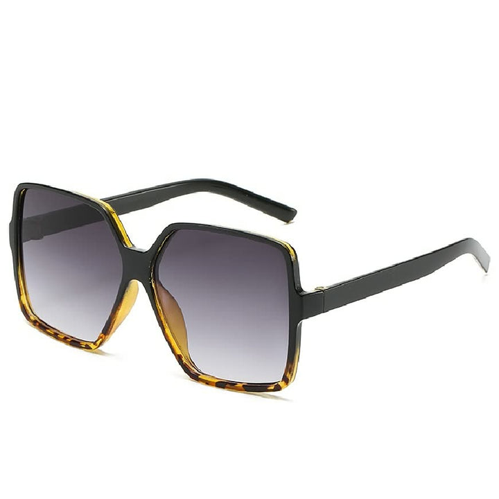 Trendy InStyle™ zonnebril voor dames, groot montuur met opvallende gekleurde glazen.