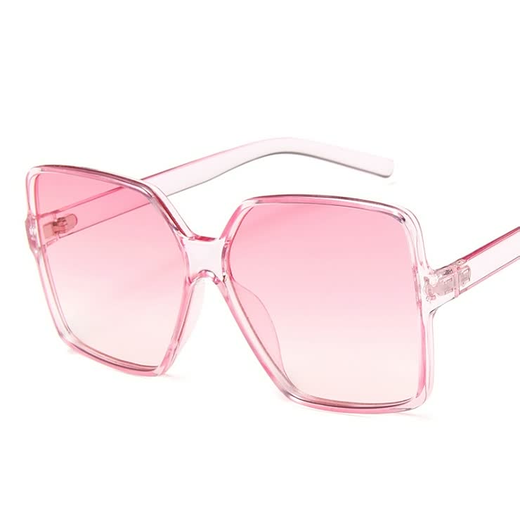 Modieuze grote dameszonnebril, essentieel accessoire met trendy gekleurde glazen.