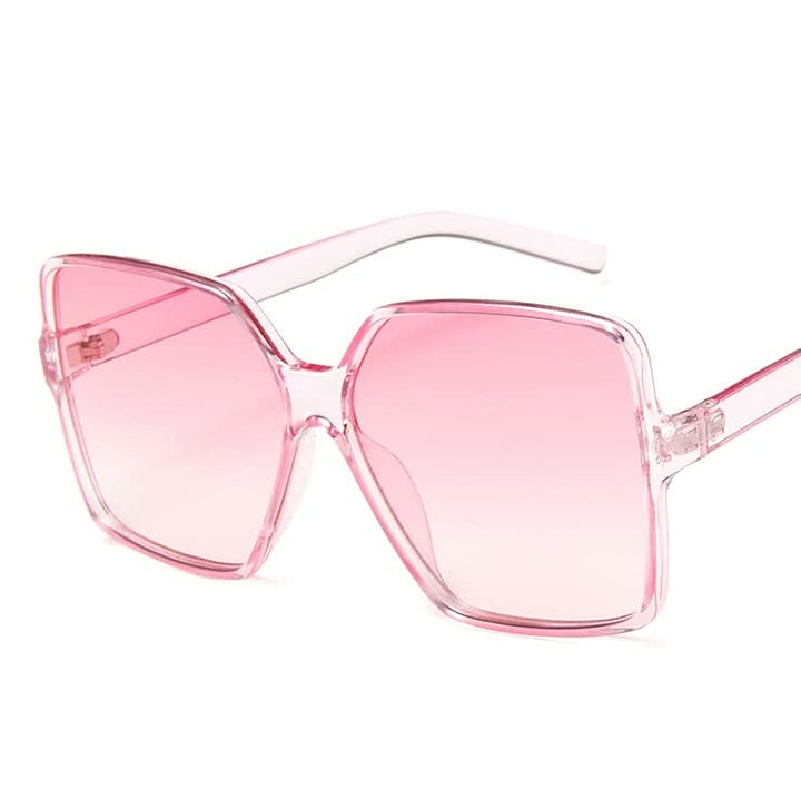 Modieuze grote dameszonnebril, essentieel accessoire met trendy gekleurde glazen.