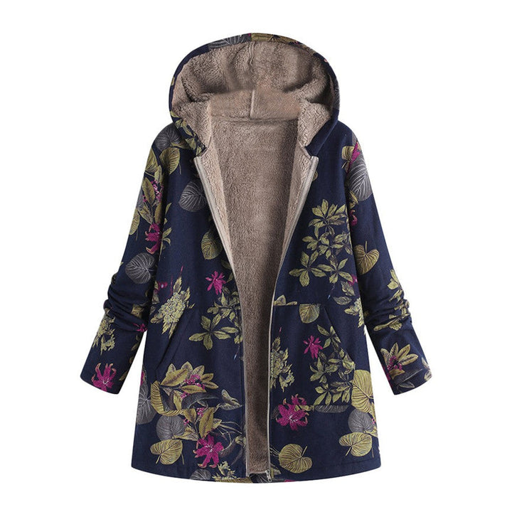 Dames tussenjas met levendige bloemenprint en praktische zakken, ideaal voor herfst- en lentemode.