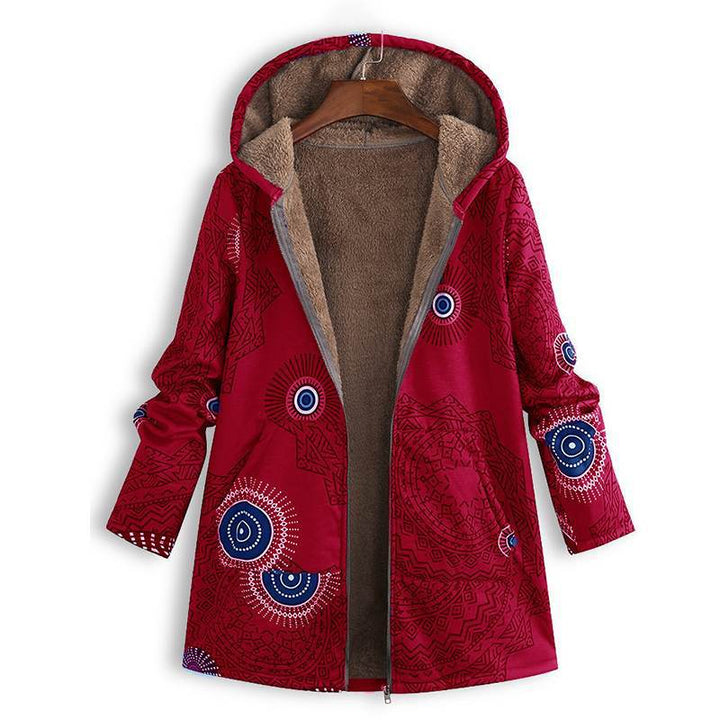 Trendy dames tussenjas met unieke bloemenprint, ruime zakken en een moderne pasvorm. Ideaal als herfstjas.