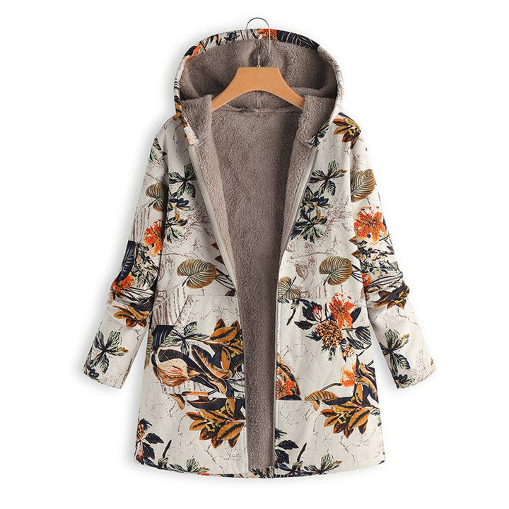 Comfortabele dameskleding: tussenjas met bloemenprint en functionele zakken, perfect voor wisselvallig weer.