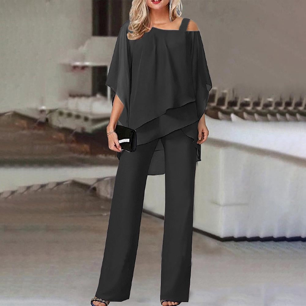 Stijlvolle dames tweedelige outfit, bestaande uit een cold-shoulder top en elegante broek voor modebewuste vrouwen.