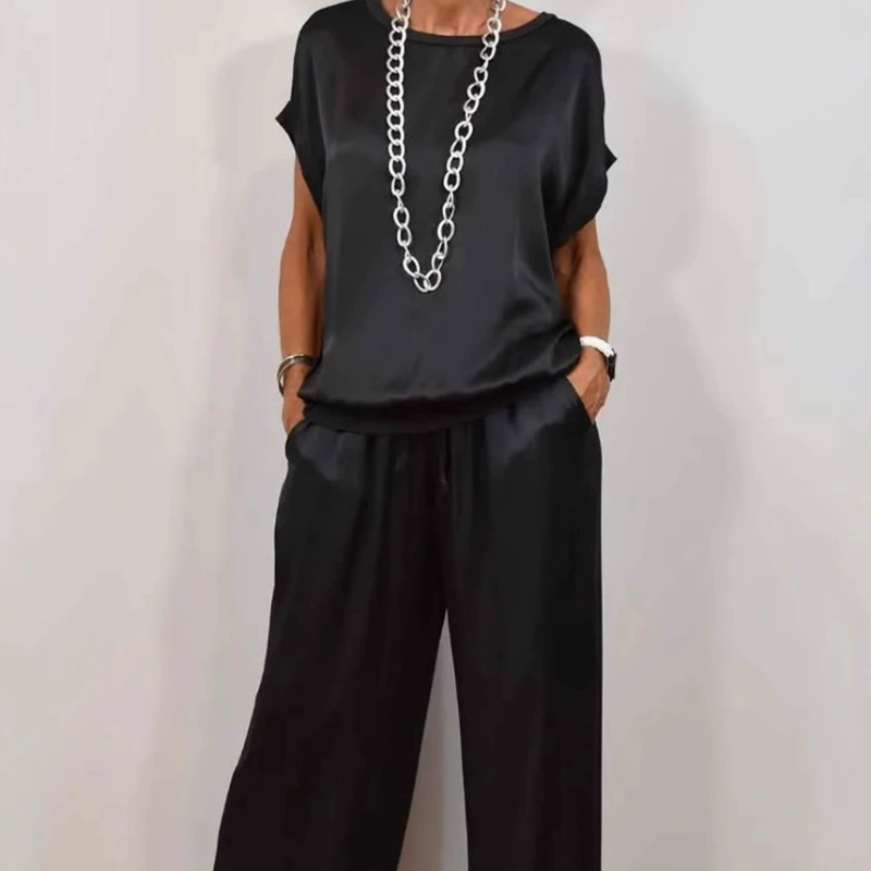 Dames relaxte fit set: comfortabele broek met wijde pijpen en casual top. Perfect voor elke dag.