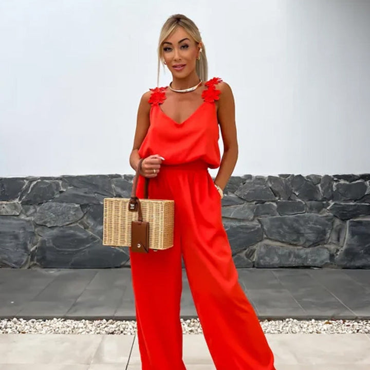 Chique dames jumpsuit met V-hals, maxi lengte en wijde pijpen. Perfect voor een comfortabele stijl.