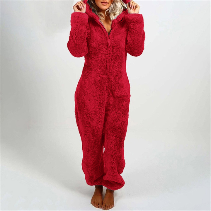 Knusse gevoerde dames onesie, perfect als warme winterpyjama of loungewear voor thuis.