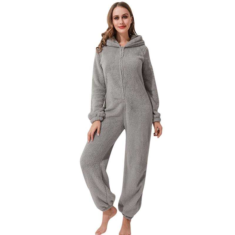 Lange mouw dames onesie, gevoerd pluche, perfect als warme pyjama of comfortabele winter loungewear.