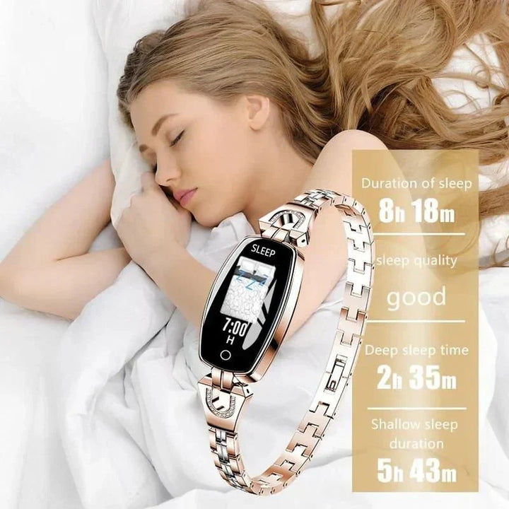 Zilveren waterdichte smart armband voor dames, trackt fitnessdoelen en gezondheidsparameters.