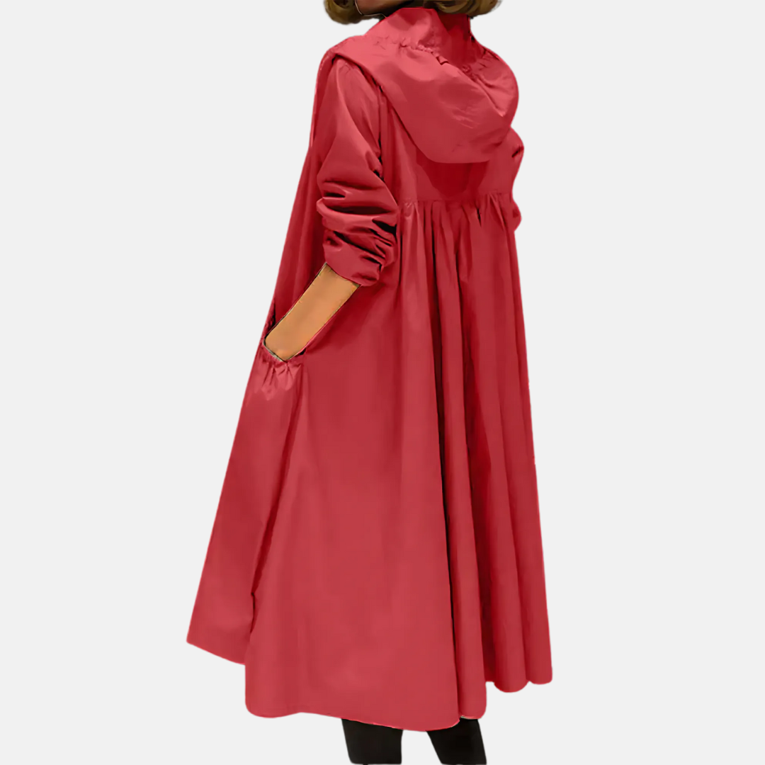 Comfortabele dames regenjas, knielang, met capuchon; de ideale lenteherfst tussenjas.