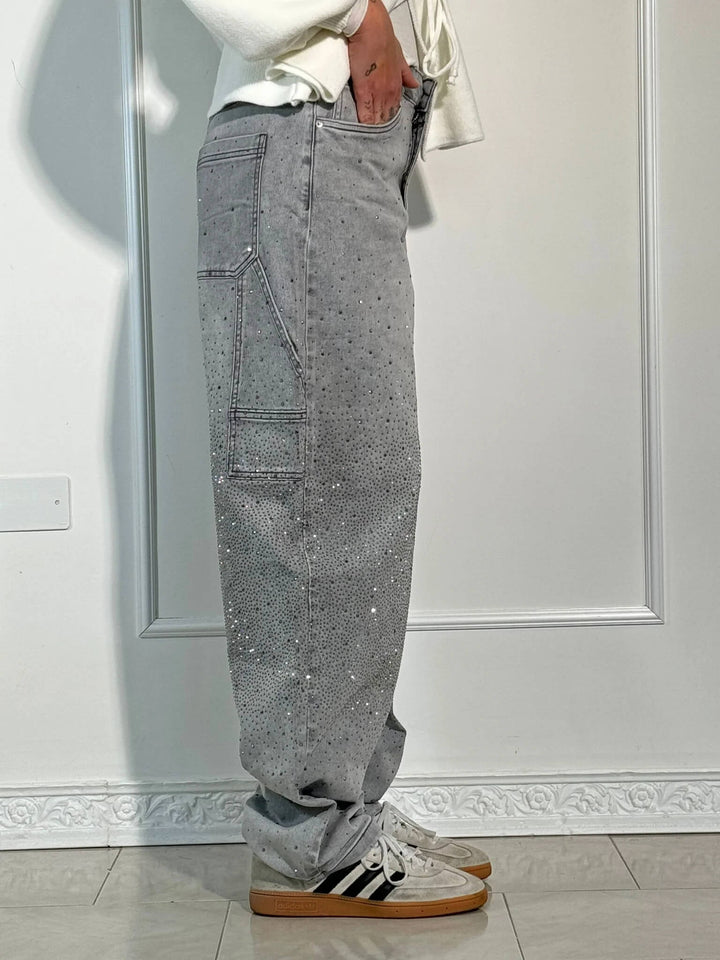 Dames jeans met strass-steentjes en wijde pijpen. Comfortabel en modieus voor alle seizoenen.