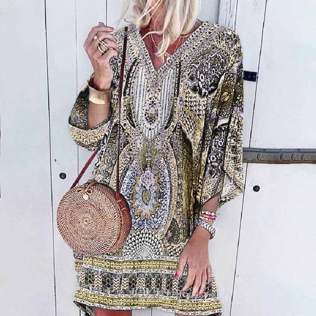 Dames zomerjurk Eva™ met vrolijke bloemenprint, luchtige stof & comfortabele pasvorm. Ideaal als strandjurk.