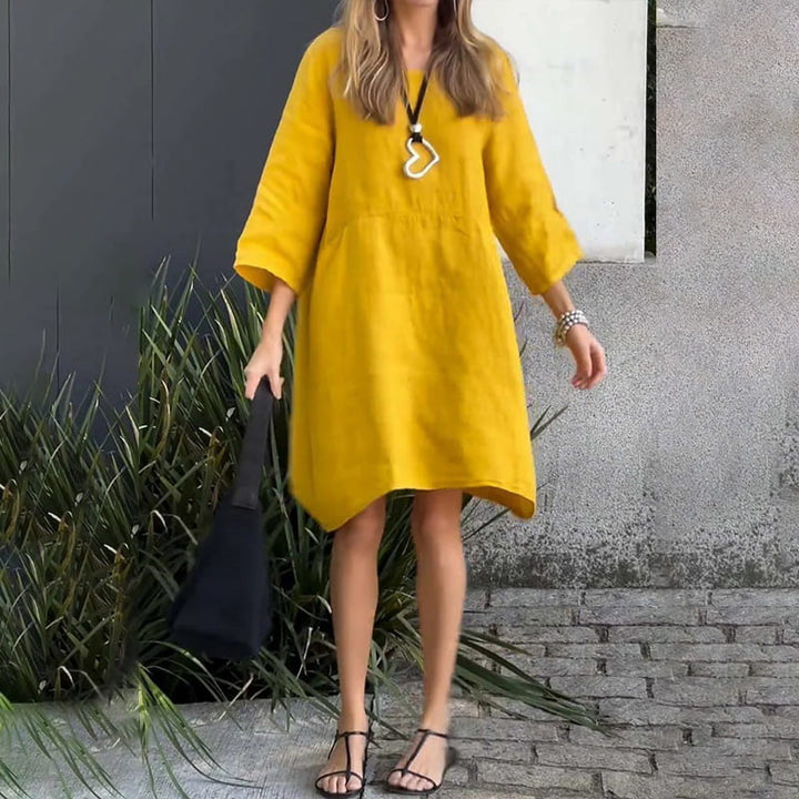 Luchtige damesjurk Malia met handige zakken, perfect als strandjurk of trendy zomerkleding.